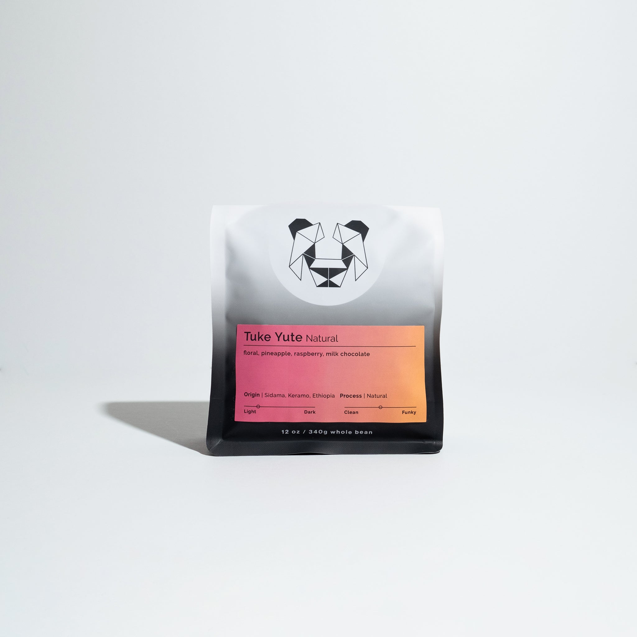 Tuke Yute - Natural coffee, showcasing Ethiopian origin with floral notes, milk chocolate smoothness, and surprising pineapple flavor, highlighting Sidama's quality coffee processing.