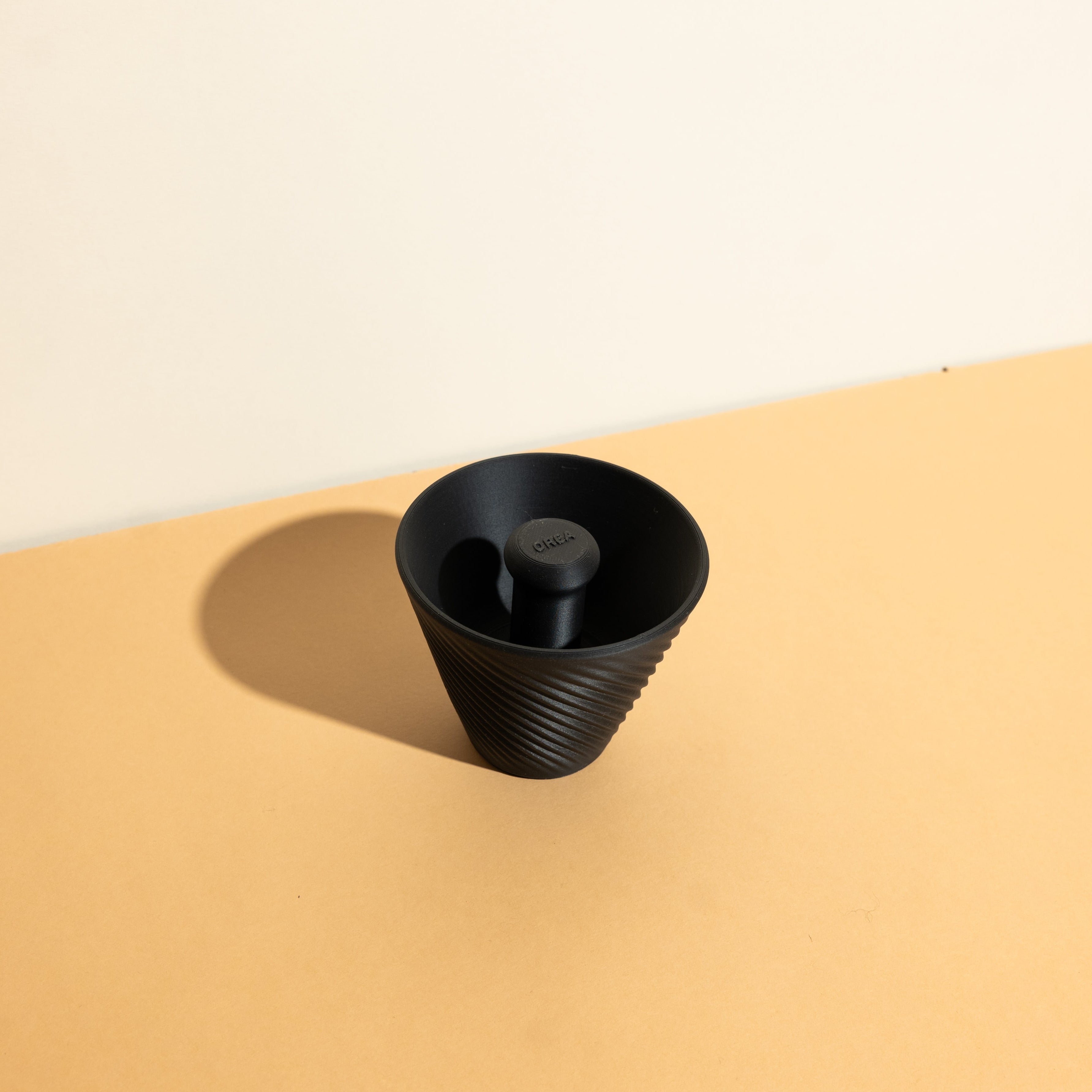 Pandagotiator accessory for Orea V3 dripper, designed for precise filter folding. Made from PLA in Galaxy Black with metallic flecks, suitable for travel brewers.