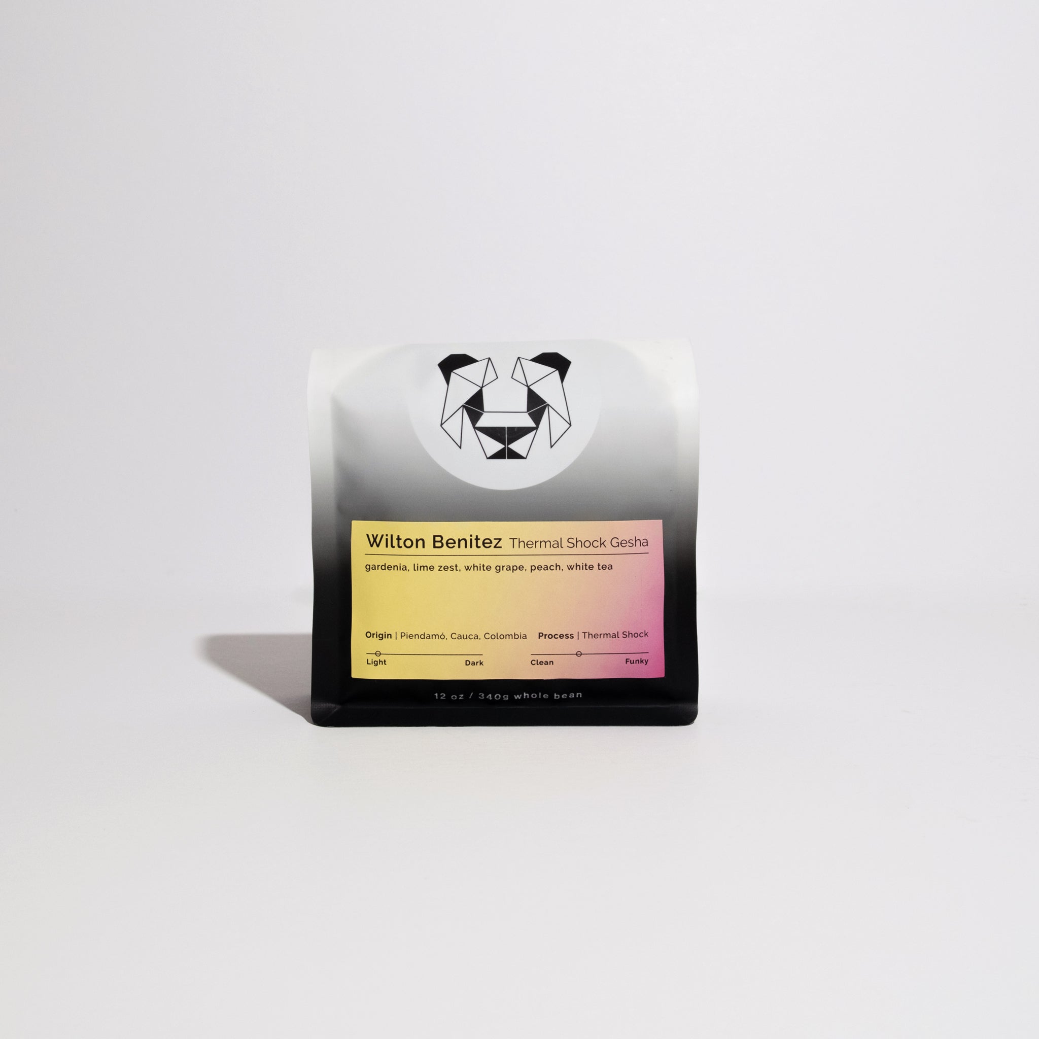 Wilton Benitez - Thermal Shock Gesha: Yellow card with black text beside dog logo, highlighting innovative coffee processing by Granja El Paraíso-92 in Colombia.